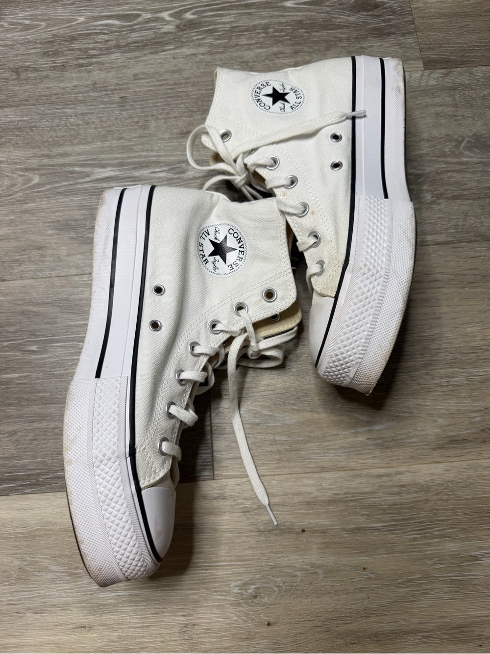 Converse White High-Top Platform Sneakers with Black Stripe